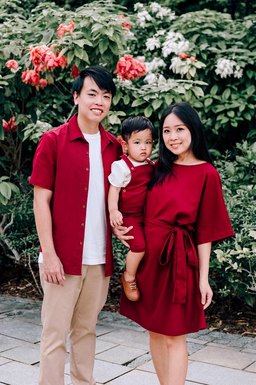 family of 3 in matching burgundy linen wear